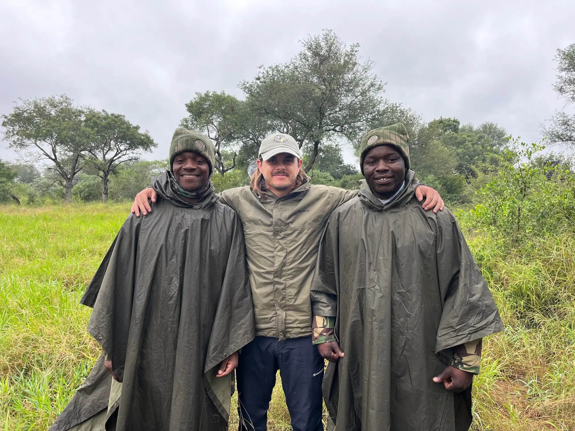 Founder with rangers in the field
